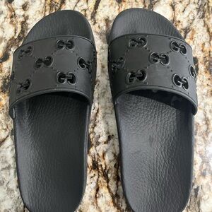 Women’s black rubber Gucci slides